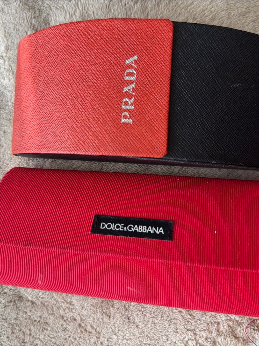Prada Red and Black and dolce and Gabbana sunglasses case